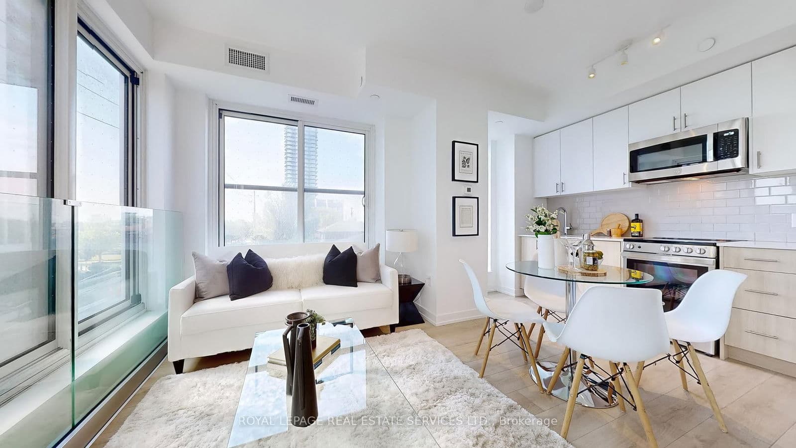 #213 - 1195 The Queensway